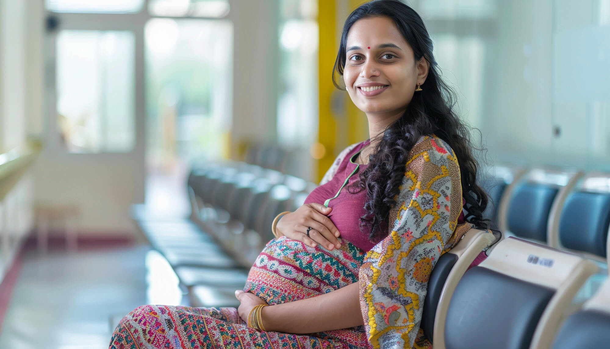 Pregnant woman receiving specialist care